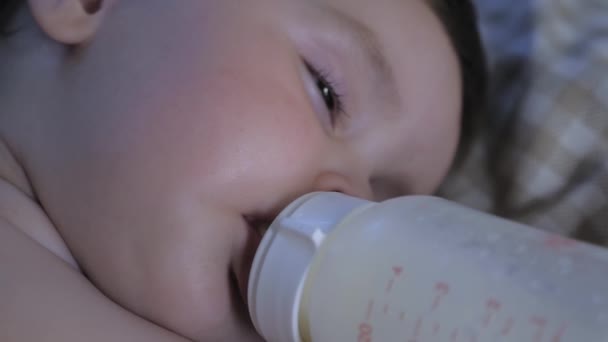 Portrait Little Child Falling Asleep Bottle His Mouth Child Eats — Stockvideo