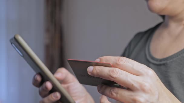 Girl Makes Purchase Using Phone Buying Internet Womens Hands Close — Vídeos de Stock