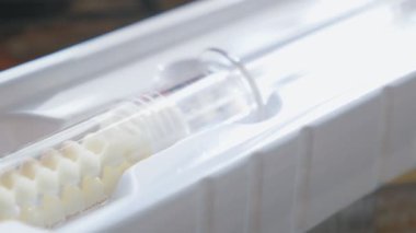 Protein for face care in a syringe. Rejuvenation at home. Health care. High quality 4k footage