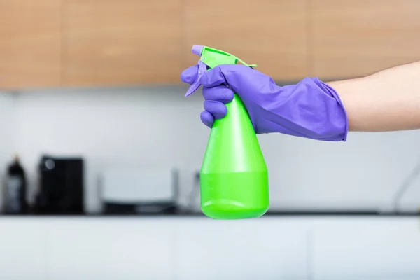 Close Hand Violet Glove Holding Green Bottle Spray Cleaning Kitchen — Stock Photo, Image