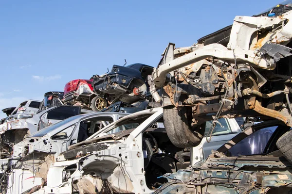 Car Cemetery - cars waiting to be recycle in junkyard in Turkey, Ankara - stacked cars in Auto graveyard