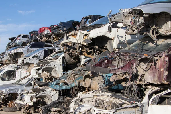Car Cemetery - cars waiting to be recycle in junkyard in Turkey, Ankara - stacked cars in Auto graveyard