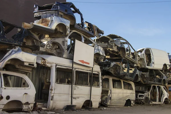 Car Cemetery - cars waiting to be recycle in junkyard in Turkey, Ankara - stacked cars in Auto graveyard