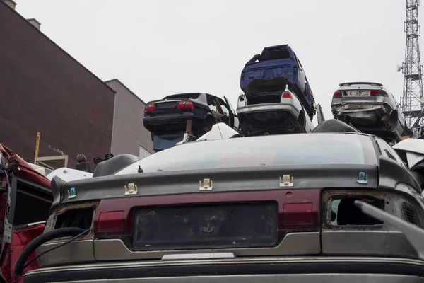 Car Cemetery - cars waiting to be recycle in junkyard in Turkey, Ankara - stacked cars in Auto graveyard