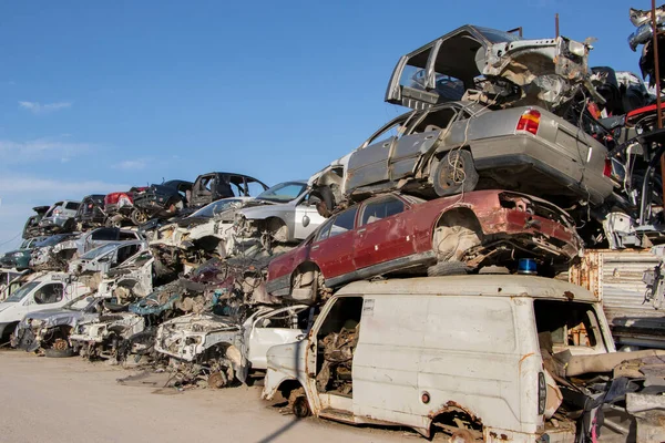 Car Cemetery - cars waiting to be recycle in junkyard in Turkey, Ankara - stacked cars in Auto graveyard