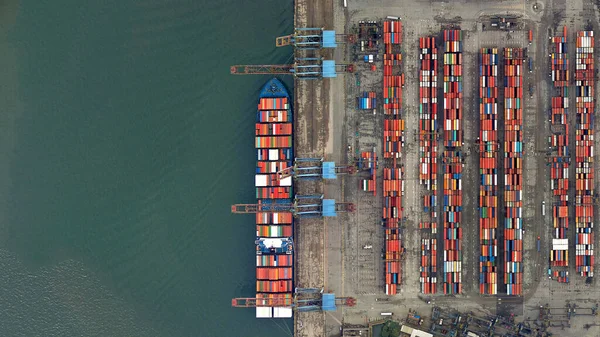 Trade, ships and containers looking down aerial view from above, birds eye view, port of Santos, Brazil