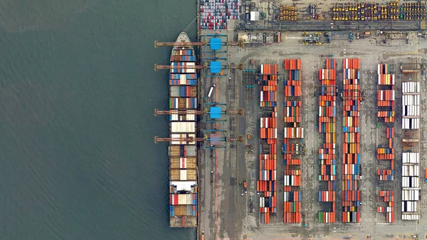 Trade, ships and containers looking down aerial view from above, birds eye view, port of Santos, Brazil