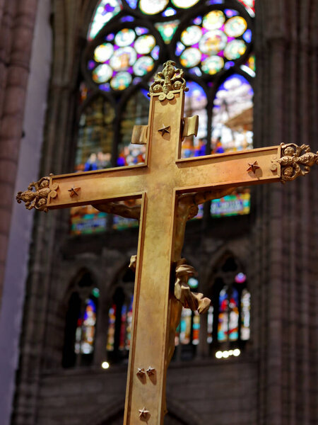Saint-Denis, France - June 15, 2019: Catholic cross at the Basilica of Saint-Denis