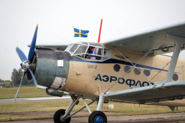KAUNAS / LITHUANIA - August 10, 2019: Lithuanian Antonov An-2 transport aircraft taxiing at air show in S. Darius and S. Girnas Airport in Aleksotas, Kaunas, Lithuania