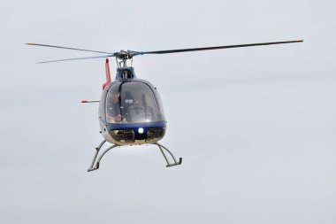 KAUNAS / LITHUANIA - August 10, 2019: Guimbal Cabri G2 two-seat light helicopter LY-CJB at S. Darius and S. Girnas Airport in Aleksotas, Kaunas, Lithuania