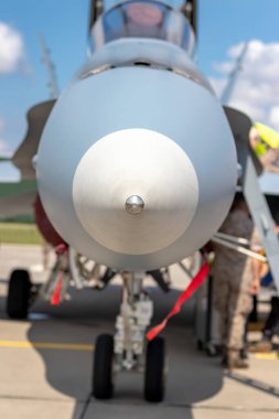 SIAULIAI / LITHUANIA - July 27, 2019: Front view of Spanish Air Force F-18 Hornet fighter jet aircraft static display at air show Falcon Wings 2019 in Siauliai Air Base