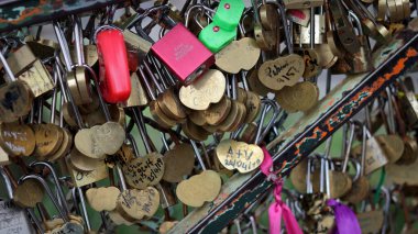 PARIS / FRANCE - June 10, 2019: love locks attached to fencing in Monmartre