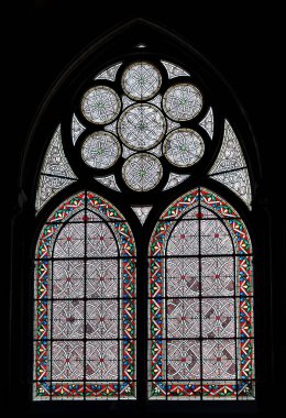 Paris, France - June 15, 2019: Colorful stained glass windows in the Basilica of Saint-Denis near Paris, France