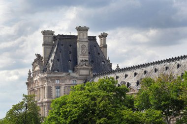 Architectural fragment of Louvre palace building in Paris, France