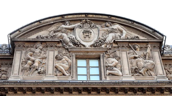 Architectural fragment of Louvre palace building in Paris, France