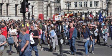 London, UK - April 24, 2021: 'Unite for Freedom' protest by covid-19 sceptics, demonstrators opposing lockdown, vaccination, mask-wearing and health passports.