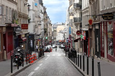 PARIS / FRANCE - June 10, 2019: Montmartre street view of Rue des Martyrs in Paris, France