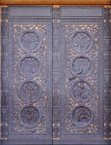 Bronze door at the entrance of the Central Portal, Basilica of Saint Denis near Paris in France