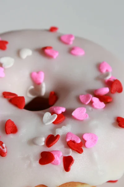 Glazed Donut Heart Shaped Sprinkles White Background — стоковое фото
