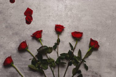 red roses on grey marble table