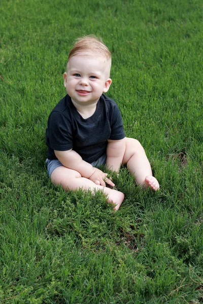 Little Baby Boy Sitting Green Grass Playing Laughing — Fotografia de Stock