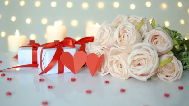 Beige Rose Bouquet Gift Boxes Candles Bokeh Lights Background Valentine — Stock video