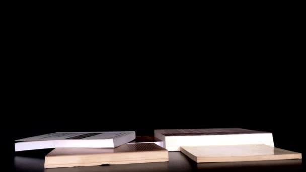 Livros Bonitos Stop Motion Com Fundo Preto — Vídeo de Stock