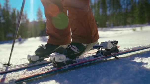 Downhill Skier Clipping Ski Boots Ski Bindings Slow Motion — Stock video