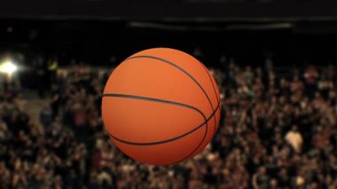 Basketball Tip Off with crowd in the background