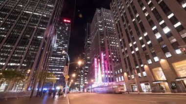 Timelapse view of buildings and traffic in New York City at night