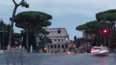 Traffic timelapse on a cloudy evening near the Colosseum in Rome