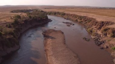 Aerial view of Mara river in the African savannah.