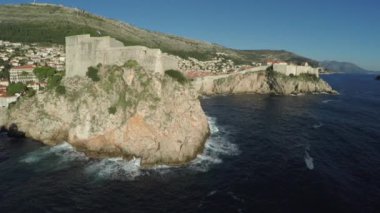 Aerial view of two of the Dubrovnik's landmarks along the coast.