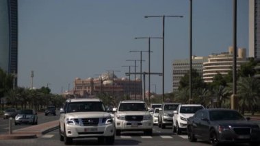 Cars driving close to the Emirates Palace in Abu Dhabi