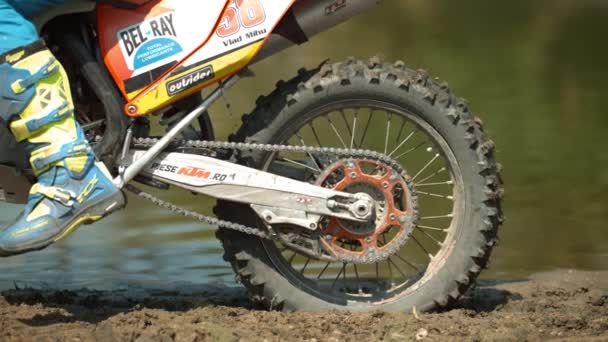 Close Motorcycle Wheel Leaving Mud — Video Stock