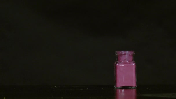 Shooting Small Jar Pink Powder Ultra Slow Motion — Stockvideo