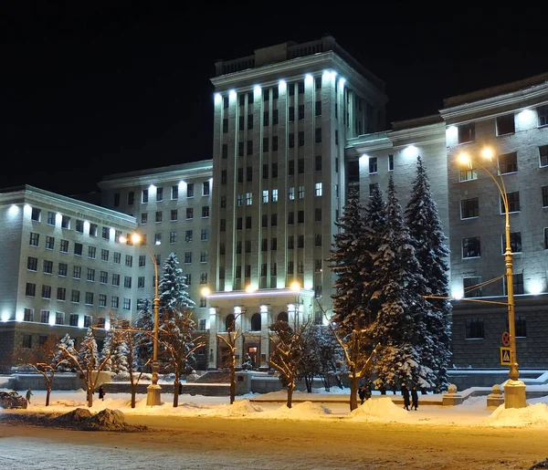 Kharkiv city. University building. Illuminated facade of a multi-storey building. Night city. Ukraine, Kharkiv
