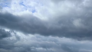 Dark clouds pass quickly in the sky before the rain. Thunderclouds covered the whole sky