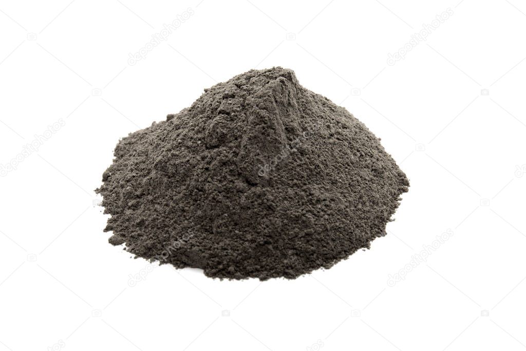 Black cosmetic clay powder isolated on white background