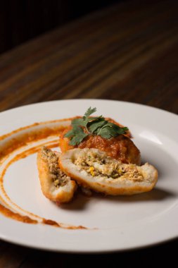 Bollo pelonu. Kel çöreğim. Etle doldurulmuş mısır hamuru. Venezuela yemekleri