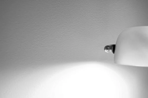Lamp Illuminating Wall Black White — Fotografia de Stock