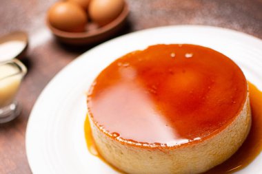 Flan. Quesillo. Creme brulee. Milk and egg dessert. Egg tart. Dessert. Candy.
