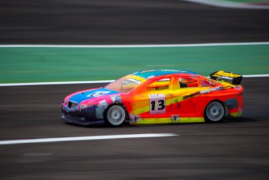 a group of sport cars on the road, remote control car