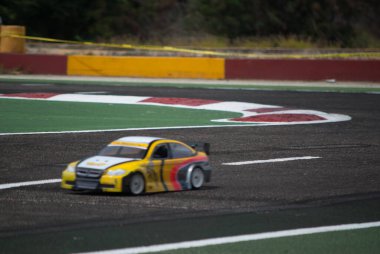 a group of sport cars on the road, remote control car