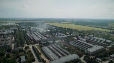 Aerial view of one building of huge plant 4K