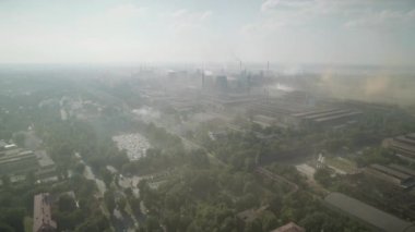 Very contaminated air and haze above Zaporozhstal plant. Aerial view 4K