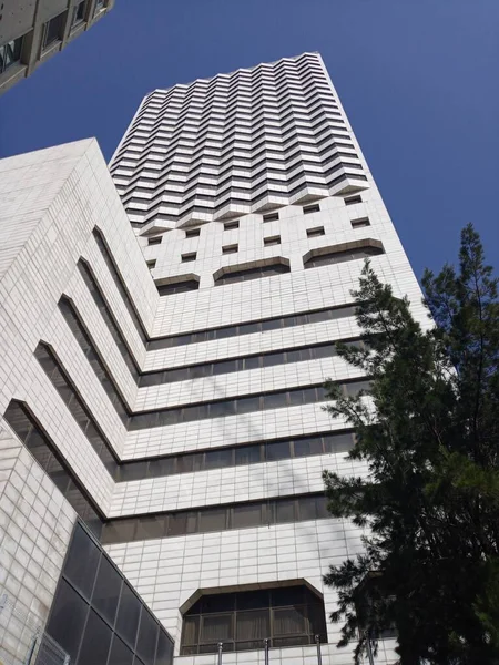Hilton Hotel with beatiful blue sky - Stock-foto