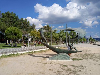 Two children's bronze sculpture in the park.