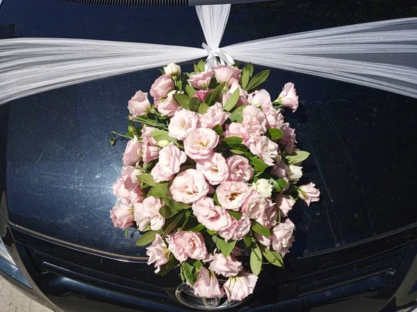Car decorated for marriage. Wedding car. Toyota brand. Roses are decorated for wedding car. Car is ready for wedding.