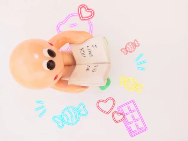 Cute Boy Figure Says Kiss Love You Designed Colorful Candies — Stock Fotó
